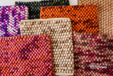 Colorful felted chunky wool rug, flat lay view