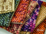 Colorful wool rug styled in a living room