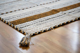 Ivory kilim rug in an entryway setting