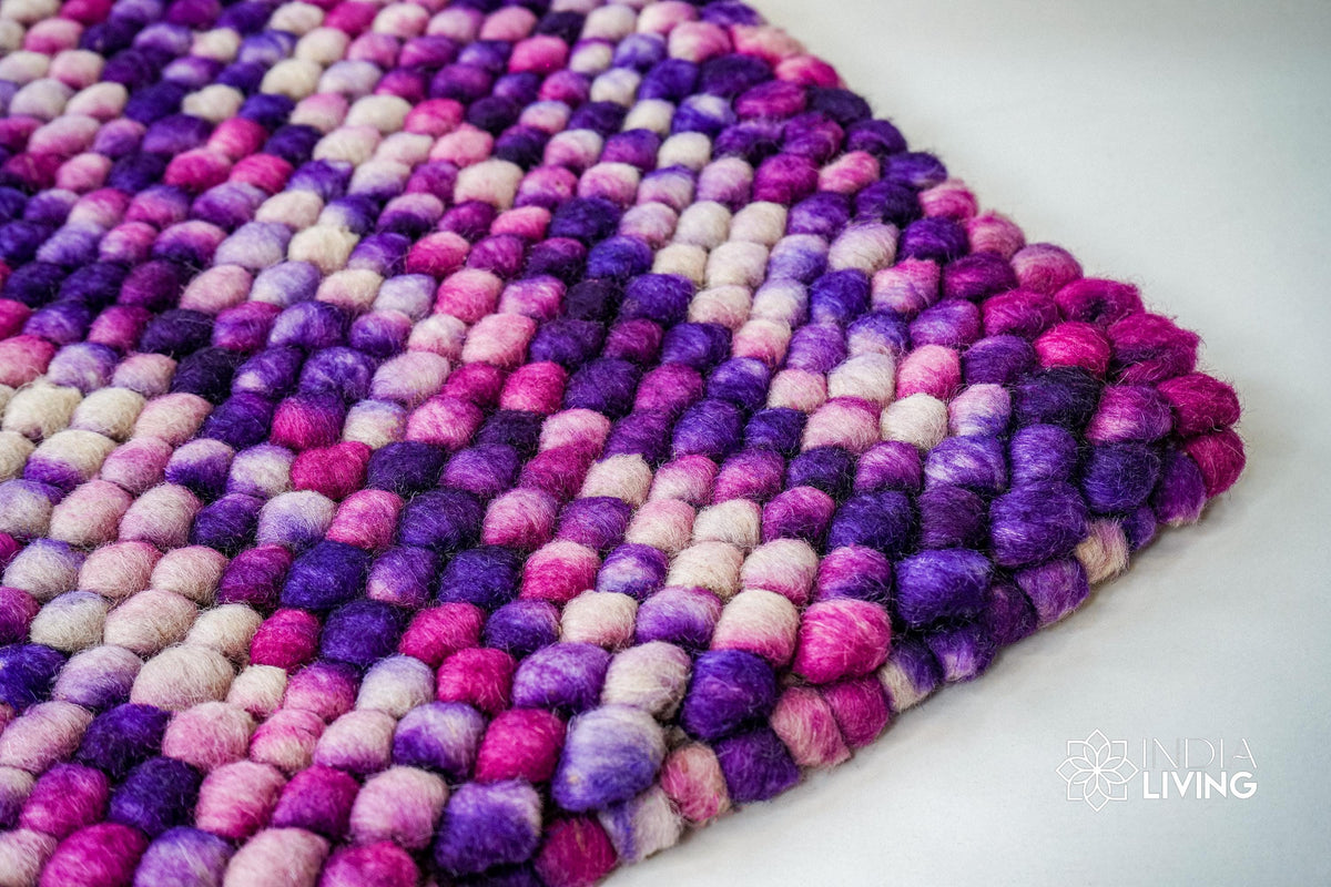Purple wool rug in a bedroom decor setting