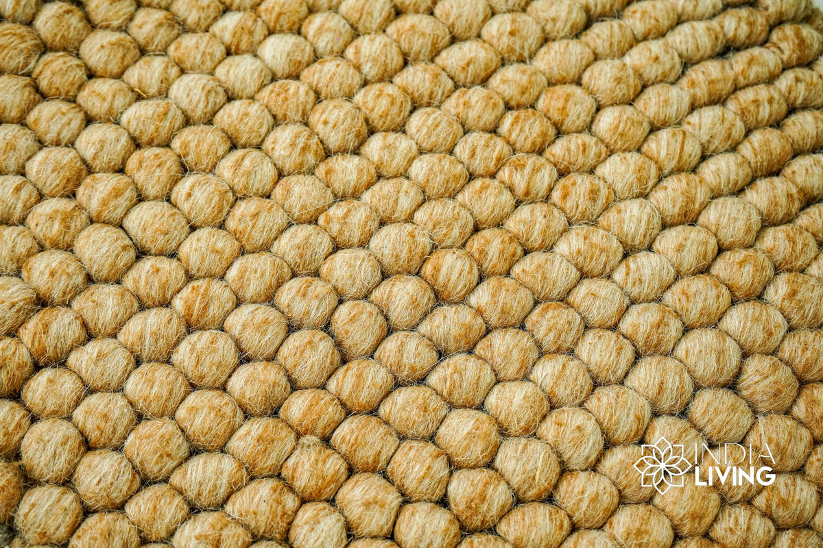 Tan beige wool rug corner detail showing reversible edge