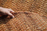 Close-up of orange jute rug weave texture