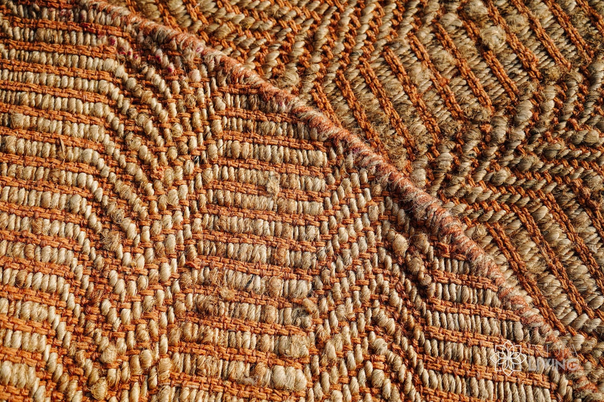 Orange jute round rug edge detail