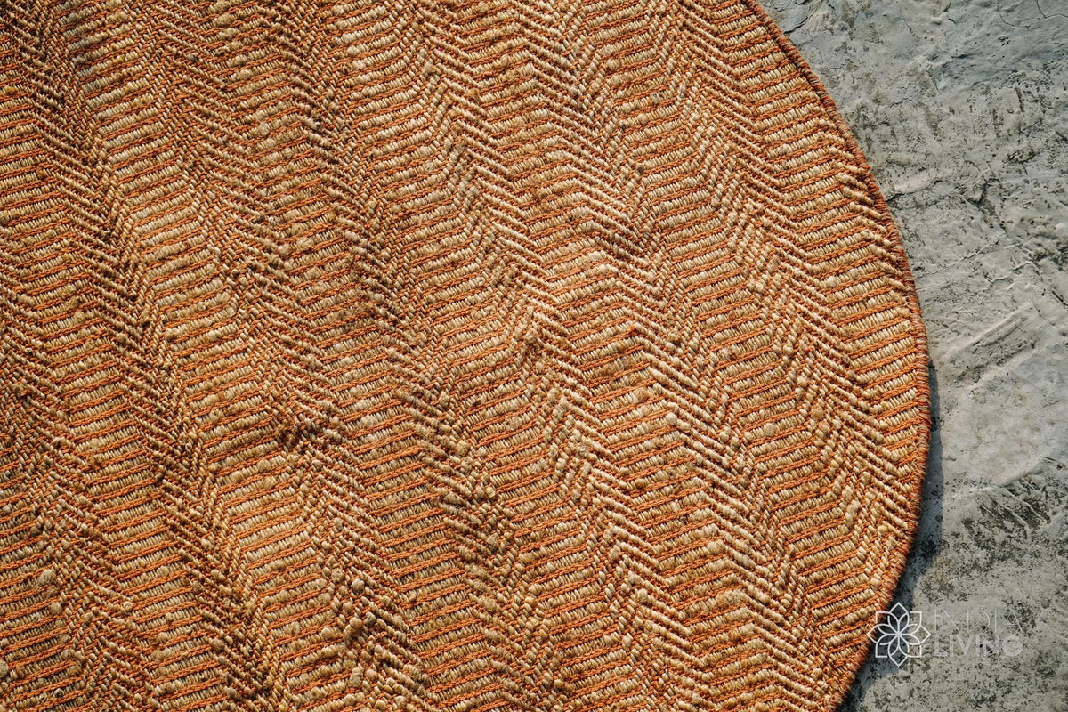 Orange jute round rug full view from above