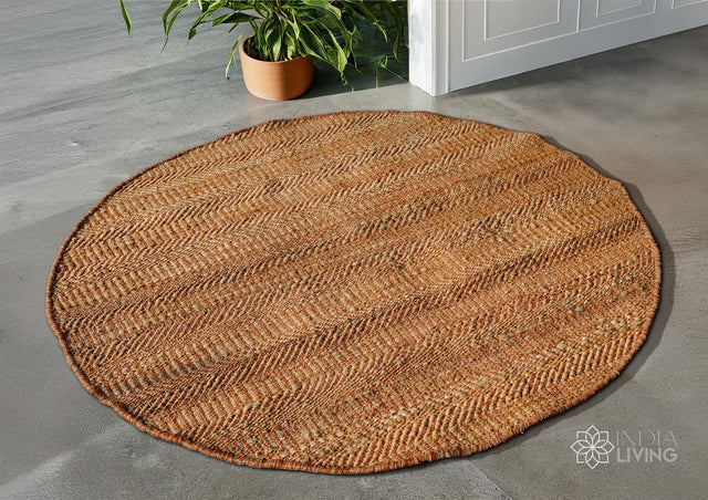 Natural orange round jute rug flat lay showing woven texture
