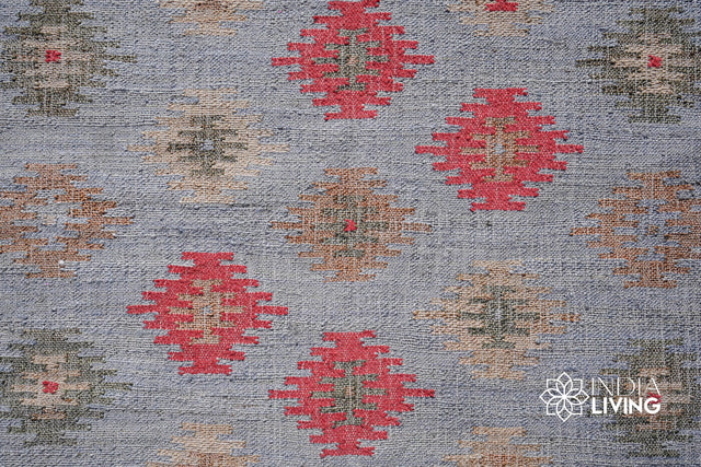 Aztec jute rug styled in a living room