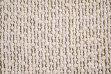 Ivory wool rug corner detail with fringe