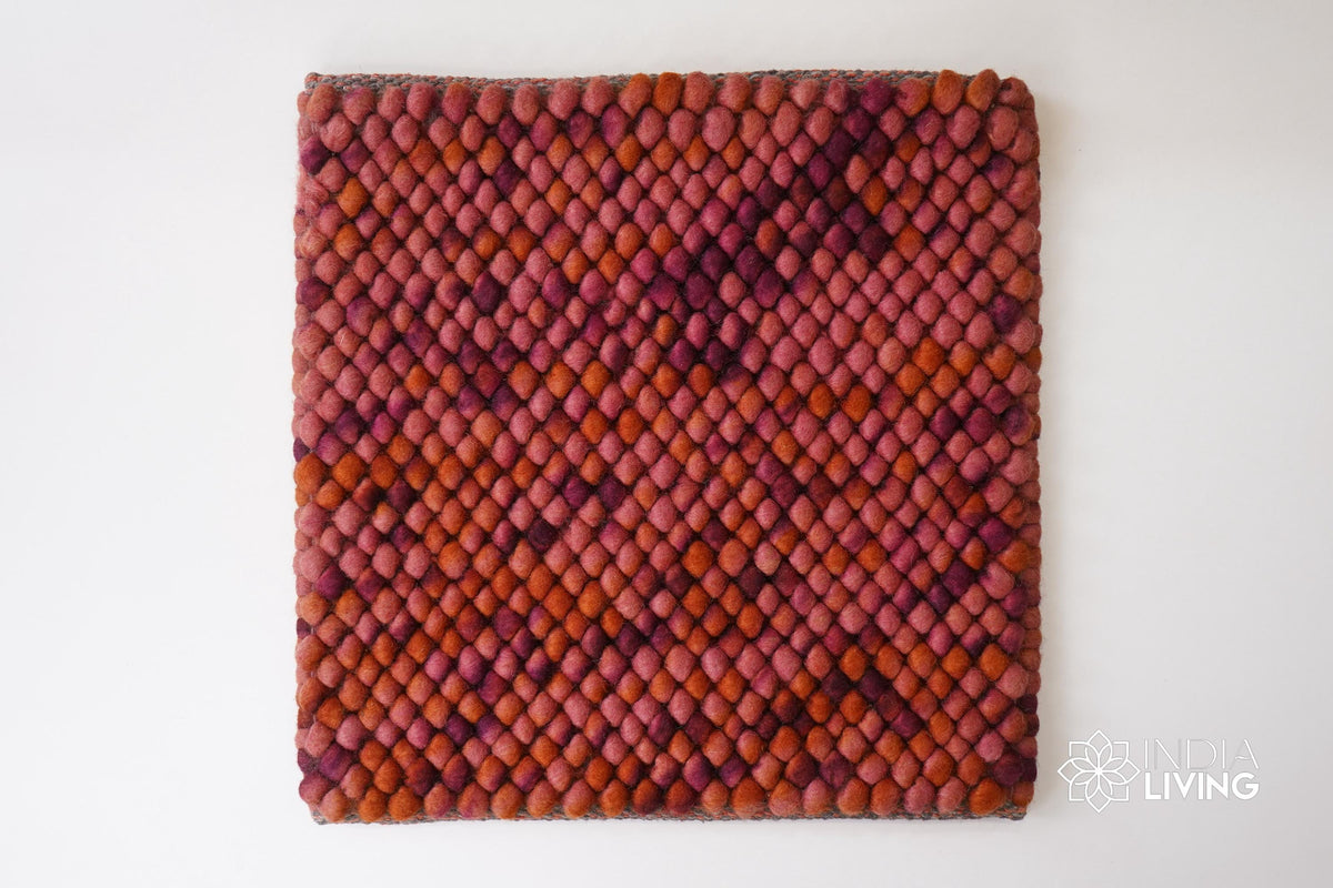 Colorful wool rug shown with pet nearby
