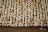 Beige brown wool rug placed under furniture