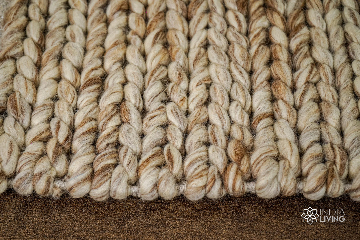 Beige brown wool rug placed under furniture