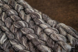 Charcoal grey wool rug texture close-up