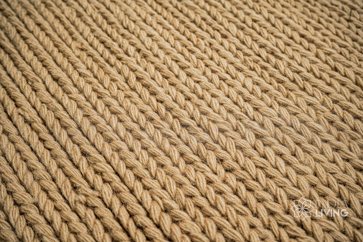 Tan beige wool rug corner and edge detail