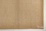 Tan beige wool rug texture close-up