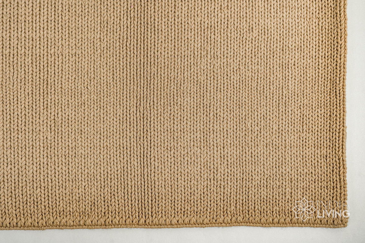 Tan beige wool rug texture close-up
