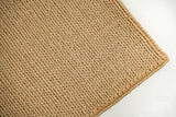 Tan beige wool rug full view from above