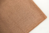 Tan brown wool rug corner and edge detail