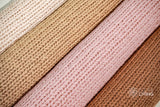 Sumac braided wool rug flat lay showing knit texture