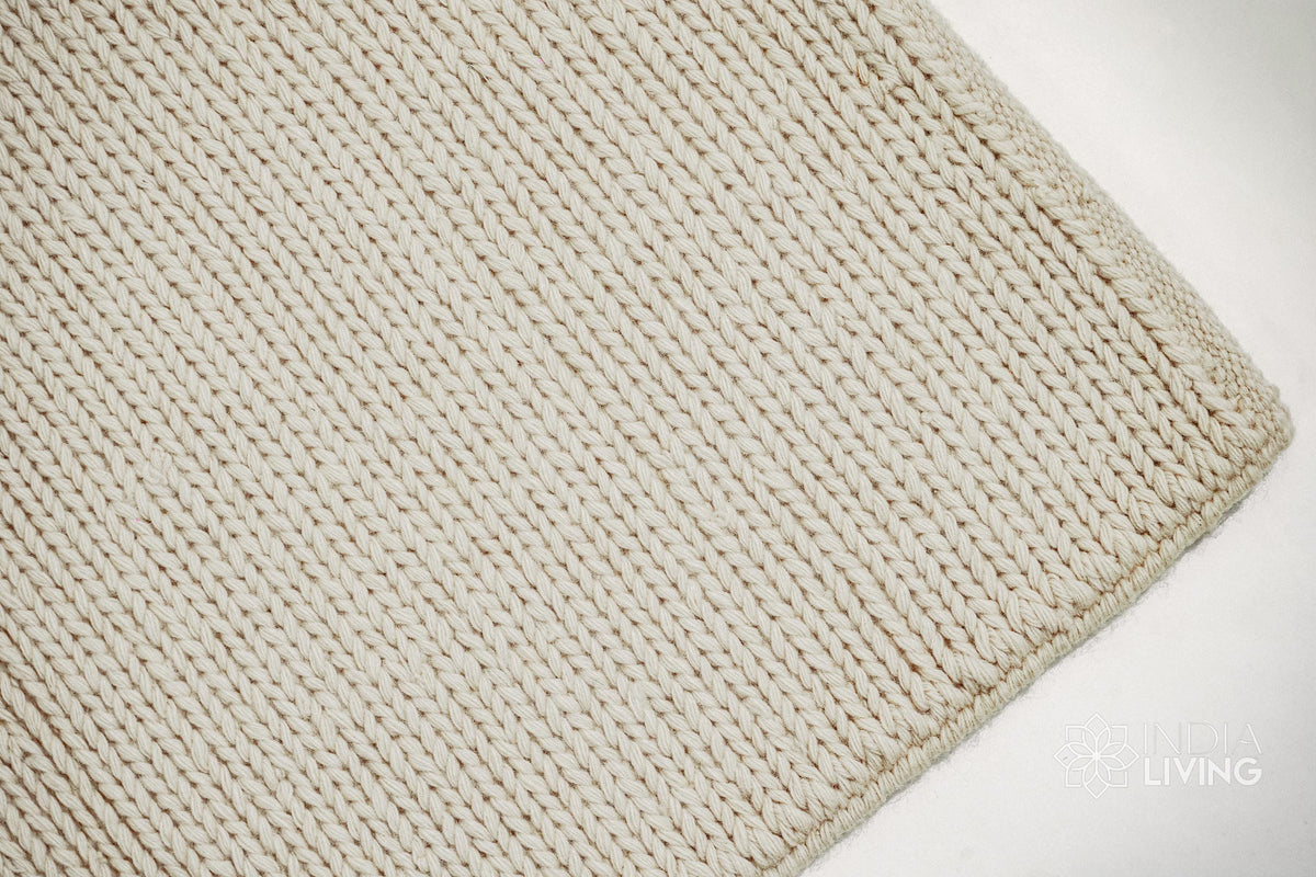 Ivory wool rug placed under furniture