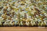 Green wool rug full size overhead view