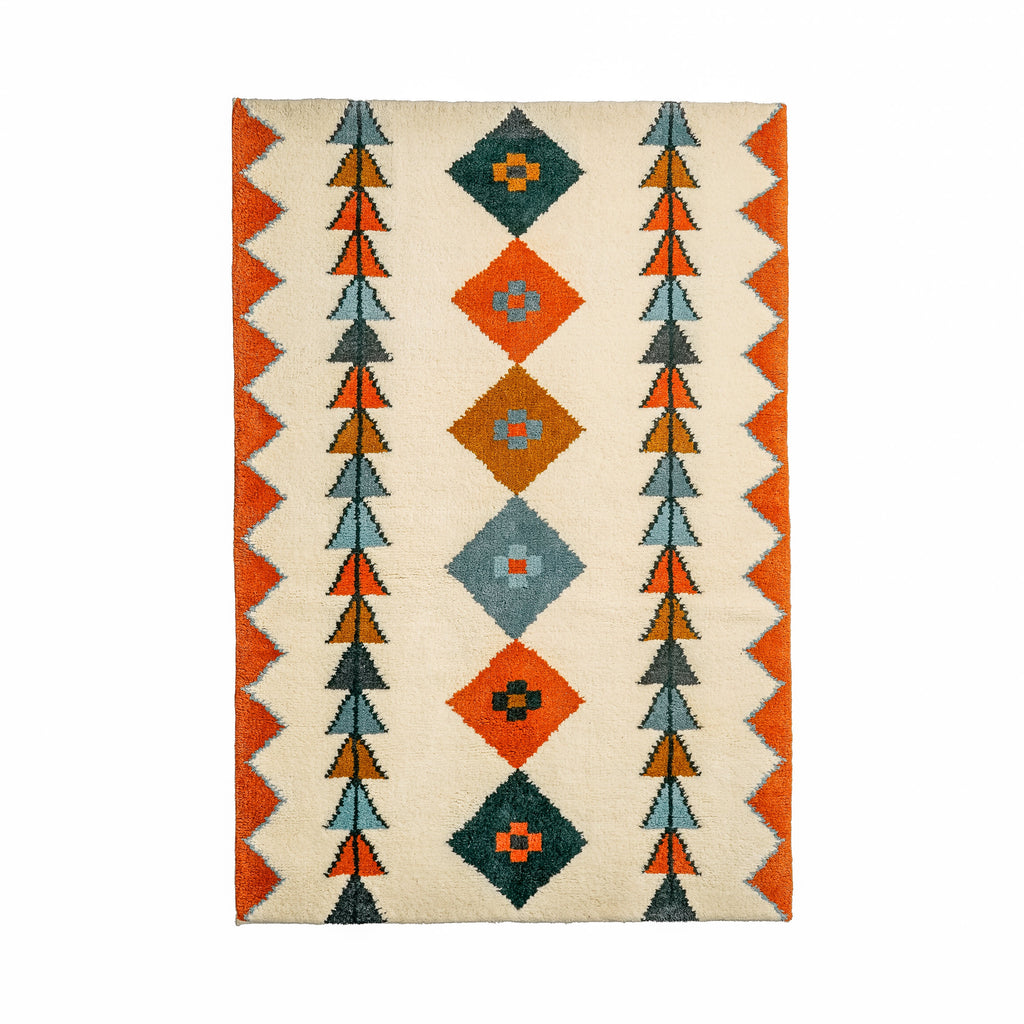 May include: A white rug with a geometric pattern in shades of orange, blue, and green. The pattern features triangles, diamonds, and small squares.