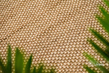 Beige wool rug corner detail