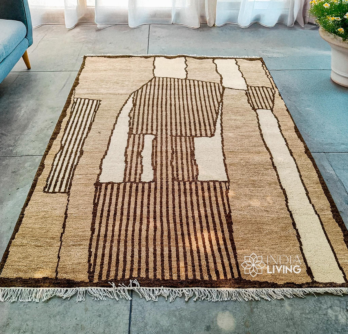 Beige brown wool rug placed in a bohemian bedroom