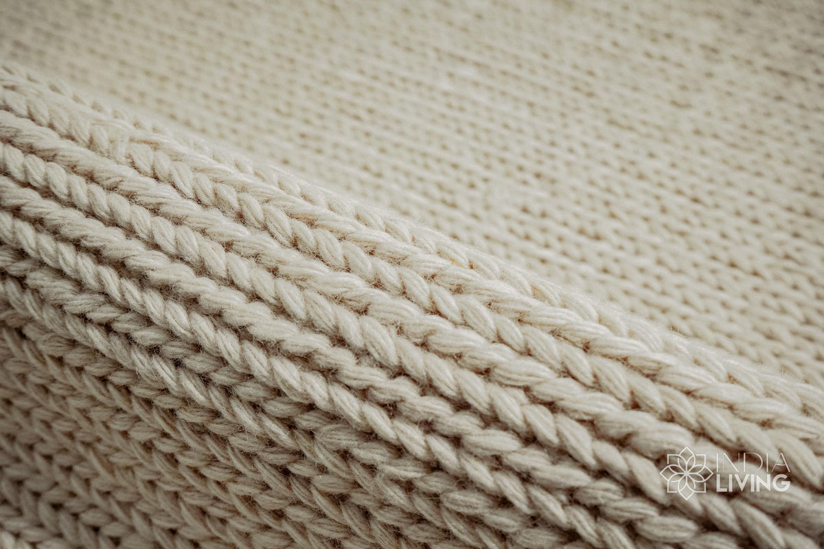 Ivory wool rug texture close-up