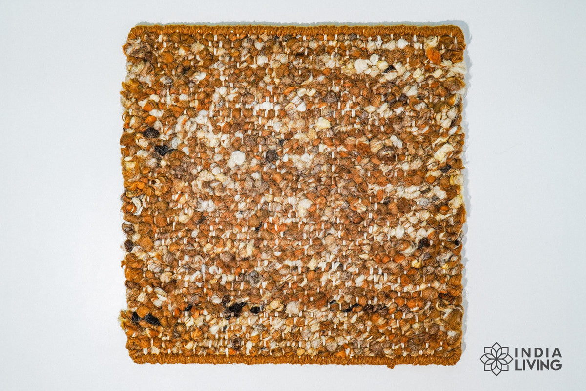 Close-up of raw wool texture in rust brown