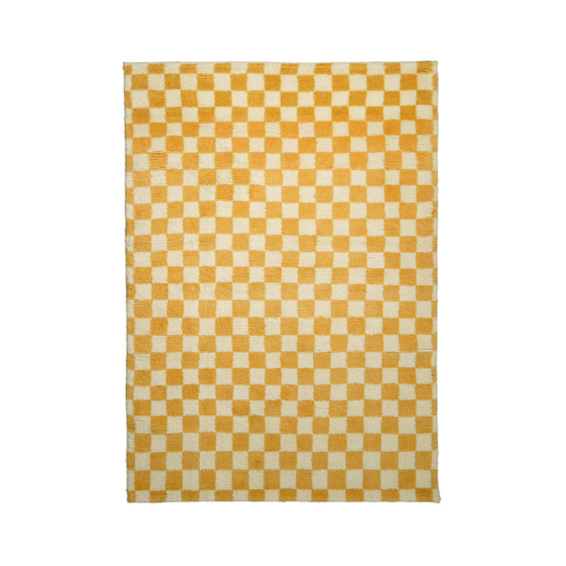 Yellow checkered wool rug flat lay