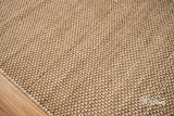 Beige wool rug pile close-up texture