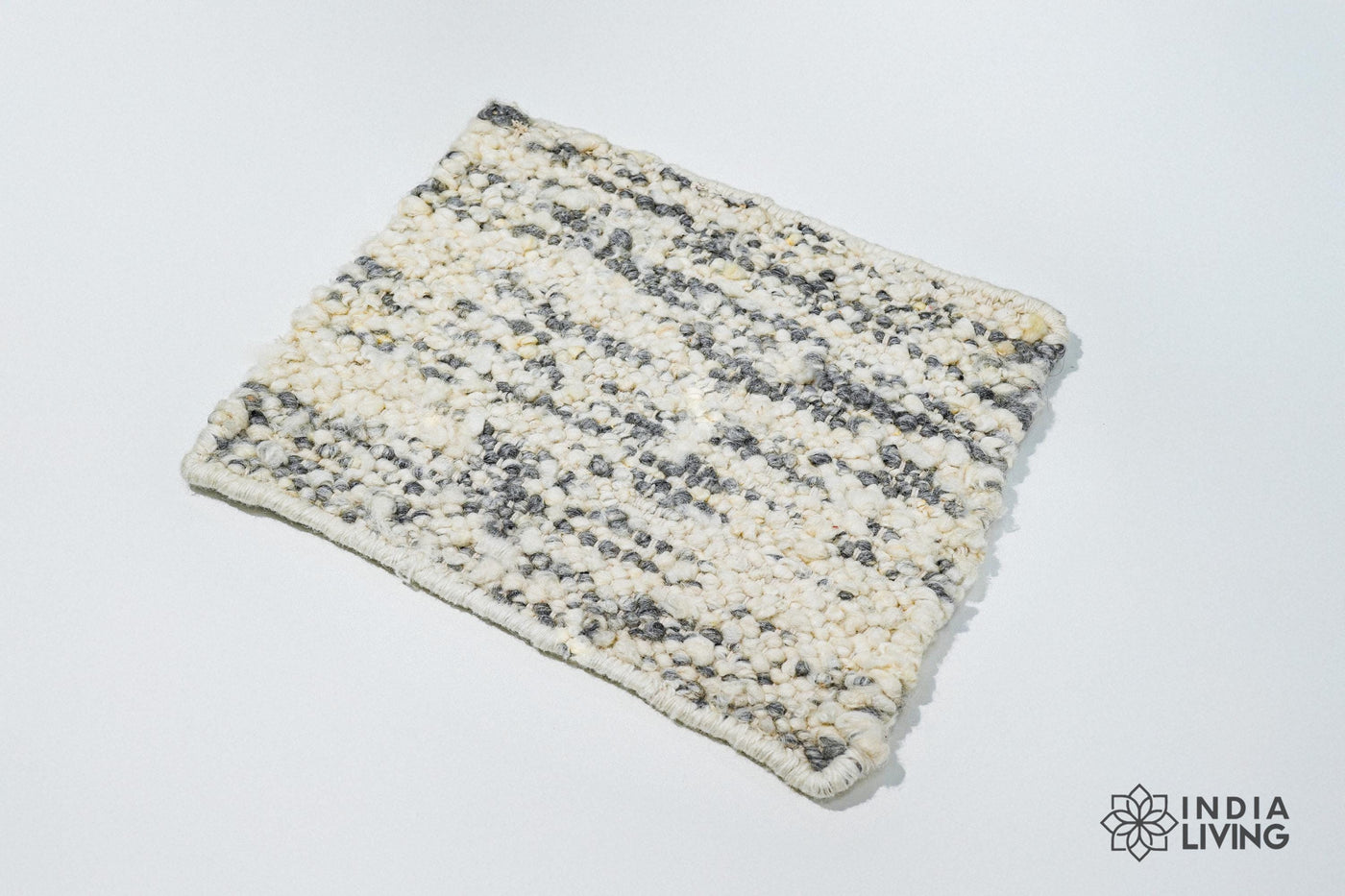 Ivory grey textured wool rug, flat lay view