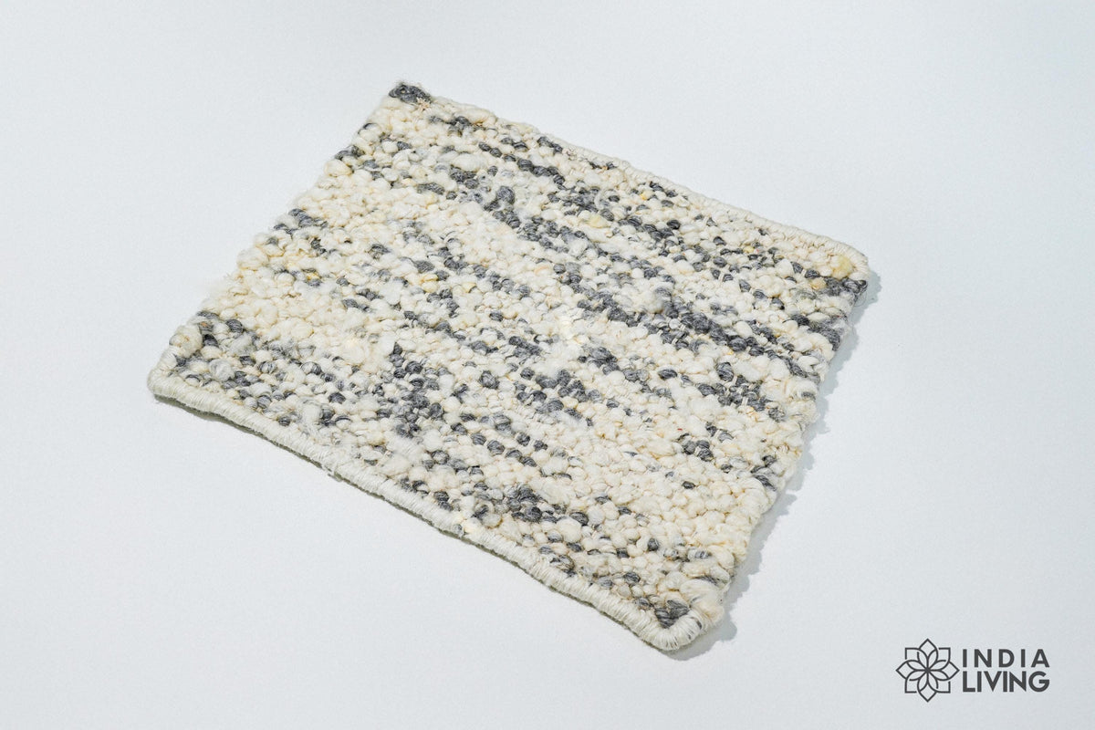 Ivory grey textured wool rug, flat lay view