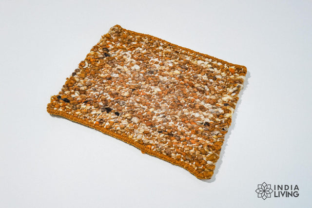Rust brown textured wool rug, flat lay view