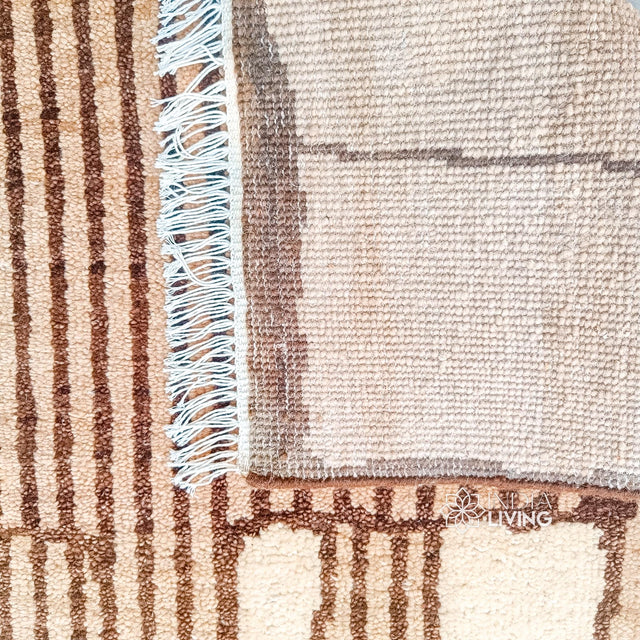 Moroccan-style wool rug styled in a living room