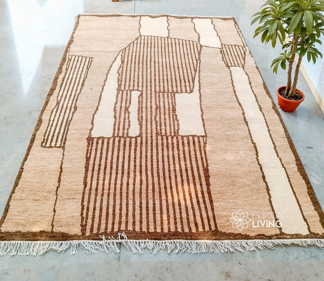Beige brown Moroccan hand-knotted wool rug, flat lay view