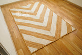 White abstract jute rug in bohemian styled room
