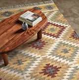 Natural jute rug styled under wooden coffee table