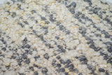 Ivory grey wool rug in a bright office setting