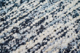 Ivory blue wool rug in a contemporary living space