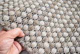 Close-up of ribbed flatweave wool texture