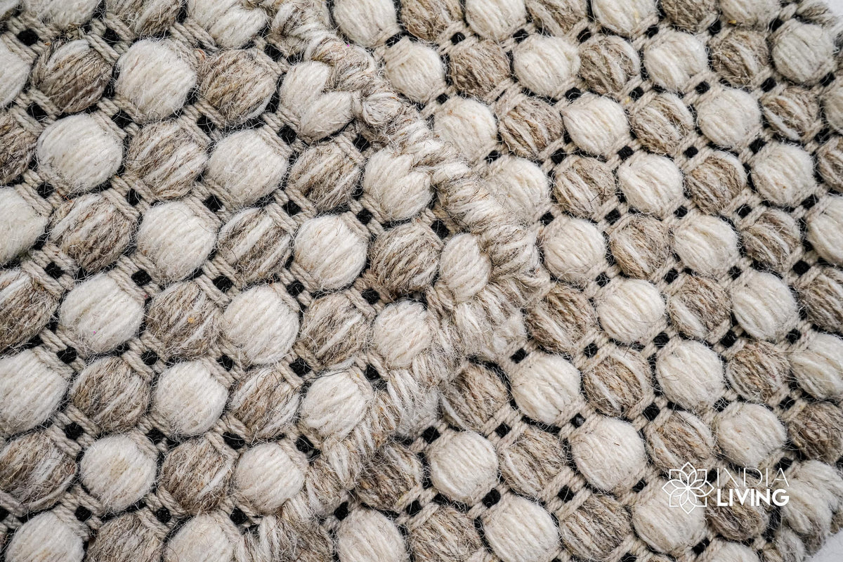 Ribbed flatweave wool rug styled in a living room