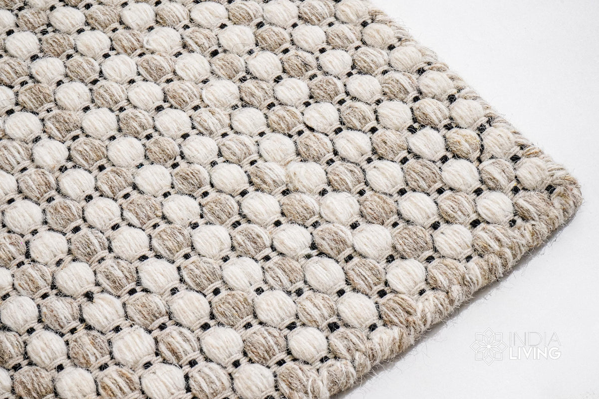 Beige cream ribbed flatweave wool rug, flat lay view