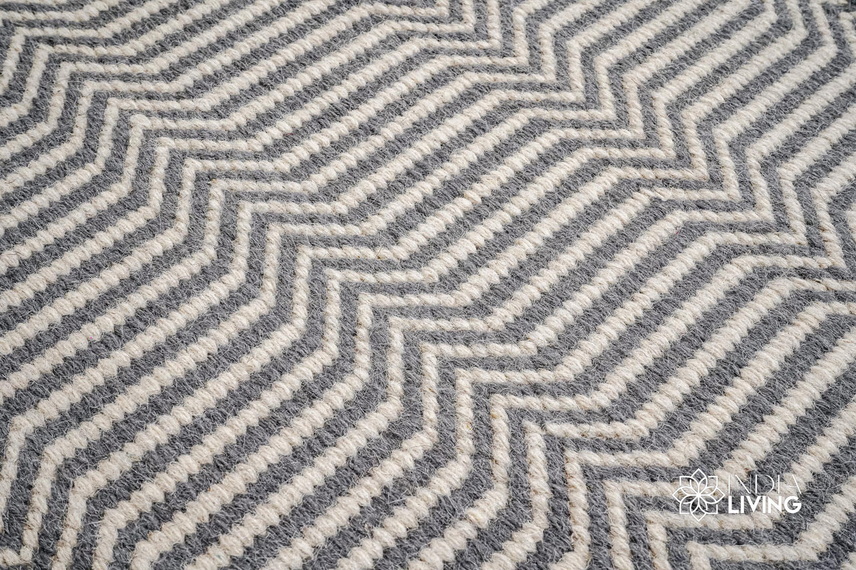 Chevron flatweave wool rug styled in a living room