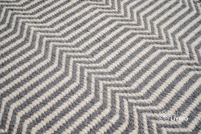 Chevron flatweave wool rug styled in a living room