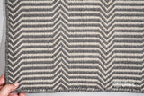 Texture close-up of handwoven chevron wool weave