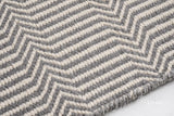 Light grey chevron flatweave wool rug, flat lay view