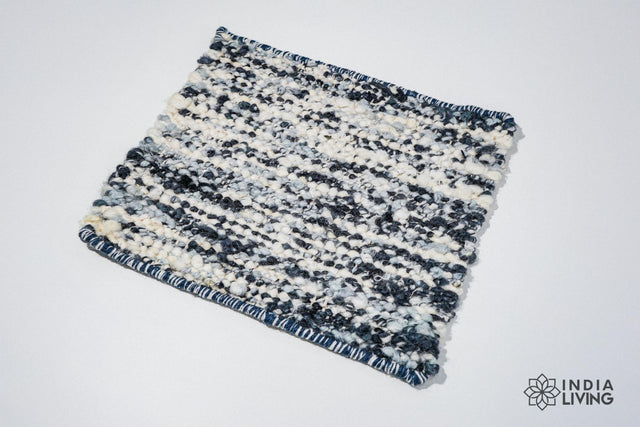 Ivory blue textured wool rug, flat lay view