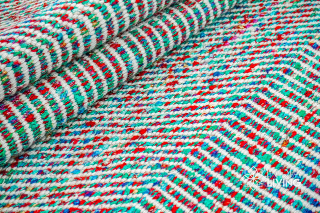 Multi blend teal blue wavy striped wool rug, flat lay view