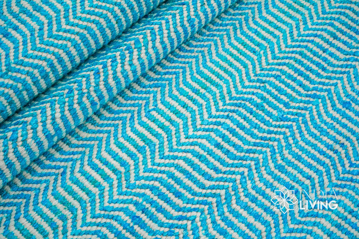 Aqua blue chevron texture wool rug, flat lay view