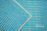 Close-up of aqua blue wavy stripe weave texture